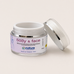 Body & Face – Copaíba, Coco y Cacao — el envase abierto, con la tapa al costado