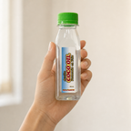 Coco Oil (100 ml) — el envase sostenido en una mano, para ver su tamaño real