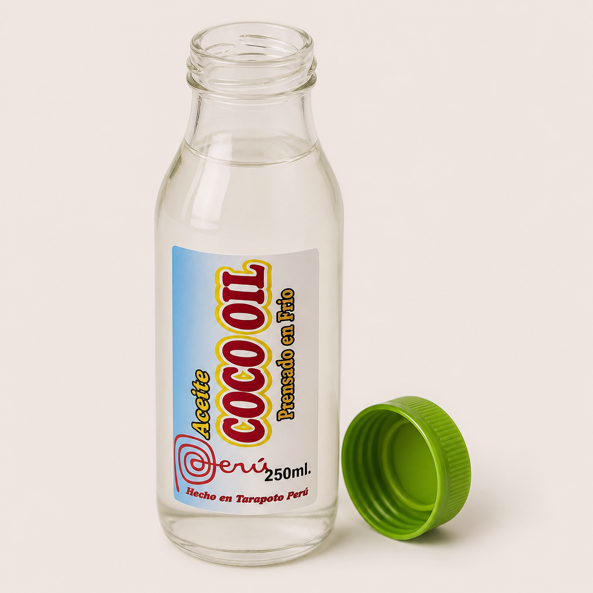 Coco Oil (250 ml) — el envase abierto, con la tapa al costado