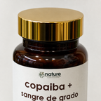 Copaiba + Sangre de Grado — detalle de la tapa dorada a rosca