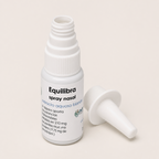 Equilibra – Spray nasal — el envase abierto, con la tapa al costado