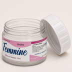 Femmine Óvulos — el envase abierto, con la tapa al costado