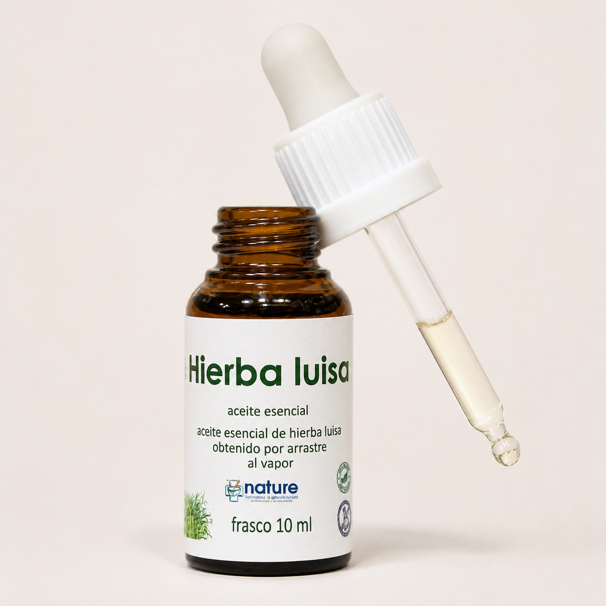 Hierba Luisa – Aceite esencial — el envase abierto, con el gotero apoyado