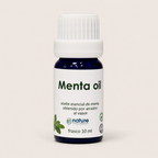 Menta Oil – Aceite esencial de menta — el envase sobre fondo claro