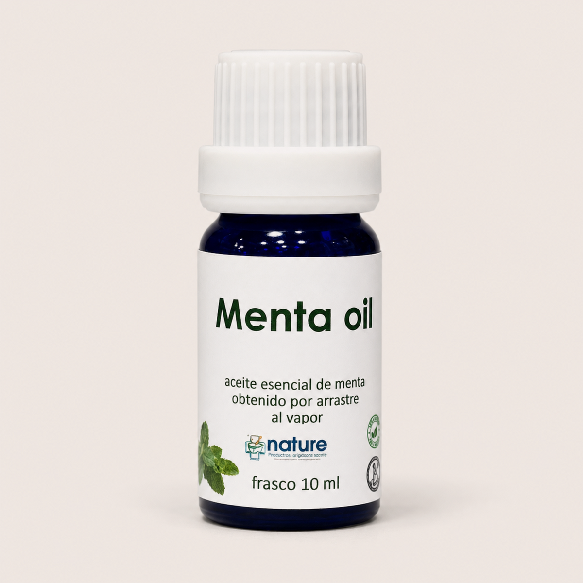 Menta Oil – Aceite esencial de menta — el envase sobre fondo claro