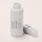 Minoxidil 5% — el envase abierto, con la tapa al costado