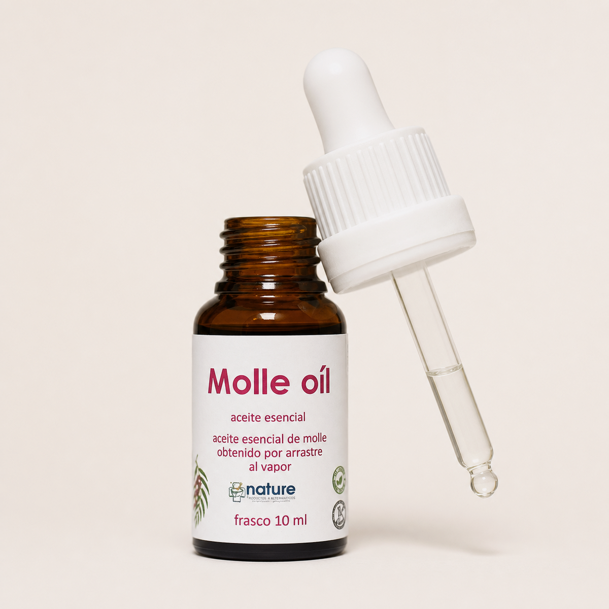 Molle Oil – Aceite esencial de Schinus molle — el envase abierto, con el gotero apoyado