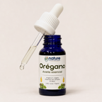 Orégano – Aceite esencial de Origanum vulgare — el envase abierto, con el gotero apoyado