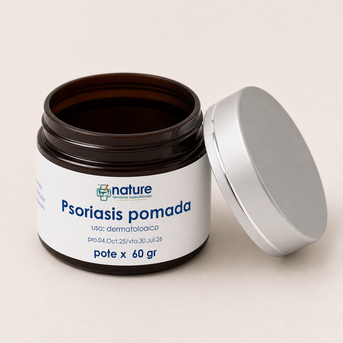 Psoriasis pomada — el envase abierto, con la tapa al costado