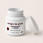 Sangre de Grado deshidratada — el envase abierto, con la tapa al costado