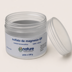Sulfato de magnesio QP 100 g — el envase abierto, con la tapa al costado