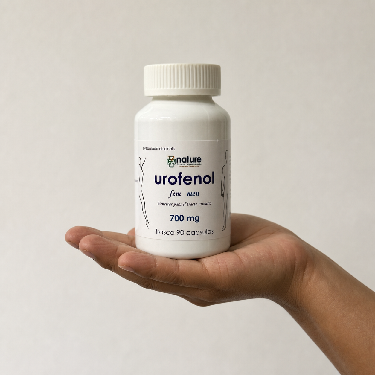 Urofenol — el frasco sostenido en una mano, para ver su tamaño real
